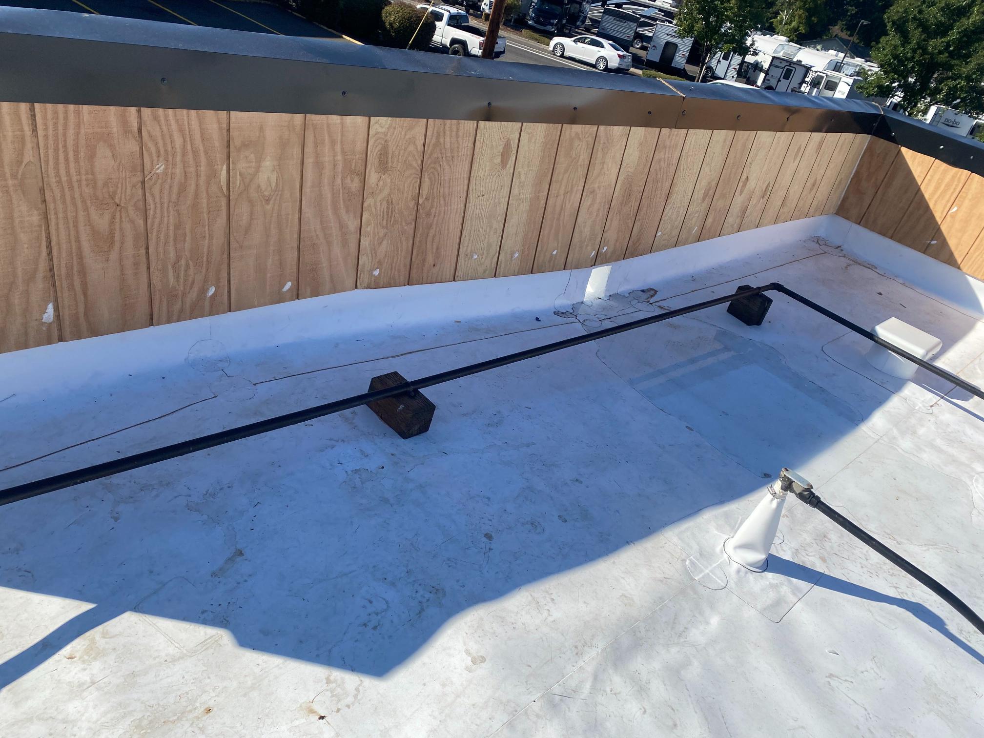 Spruce Up Northwest flat roof project 