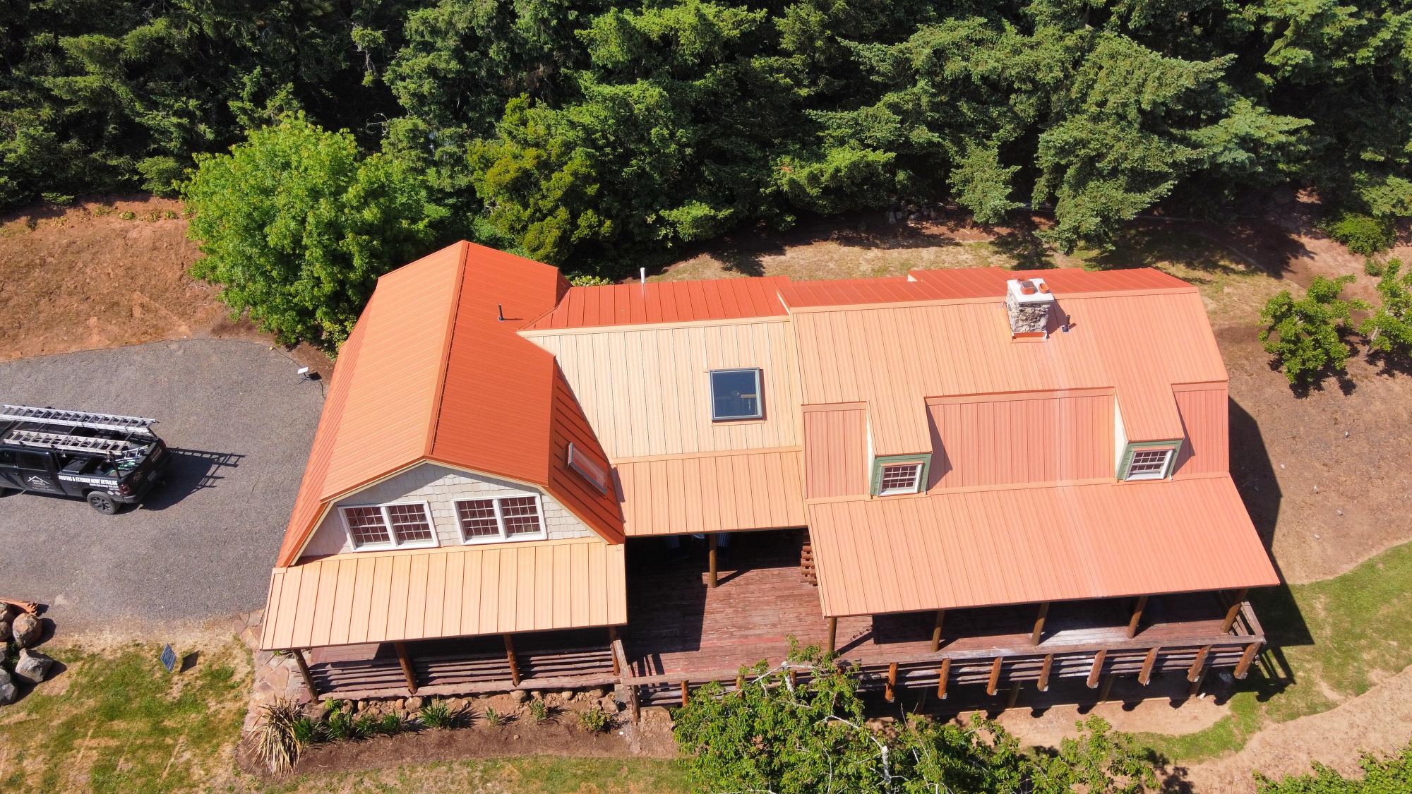 Aerial view of new standing seam metal roof on home in Portland, OR