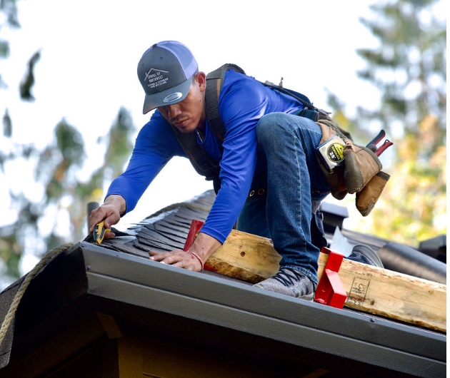 Spruce Up Northwest roofer finishing roof installation project